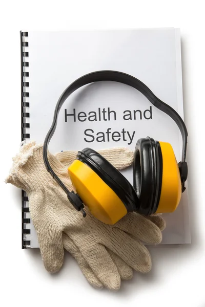 Registro de saúde e segurança com fones de ouvido — Fotografia de Stock
