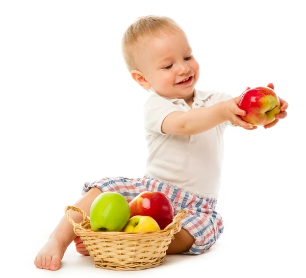 Child with basket of apples Royalty Free Stock Photos