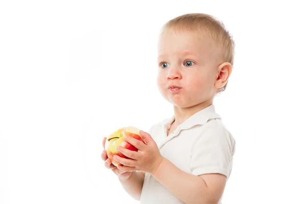 Child with a red apple Stock Image