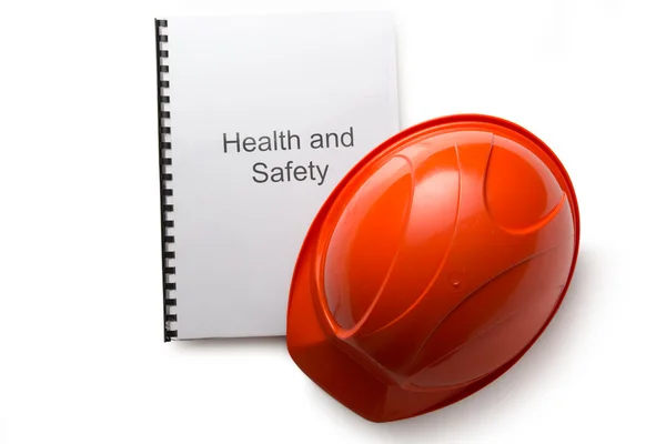 Gezondheid en veiligheid zich registreert bij een helm — Stockfoto