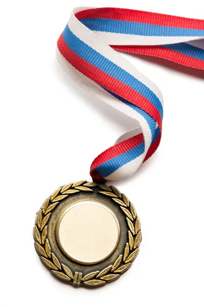 Металева медаль зі стрічкою триколор — стокове фото