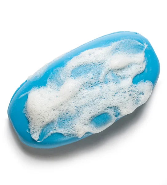 白い泡が付いた青色の石鹸 — ストック写真