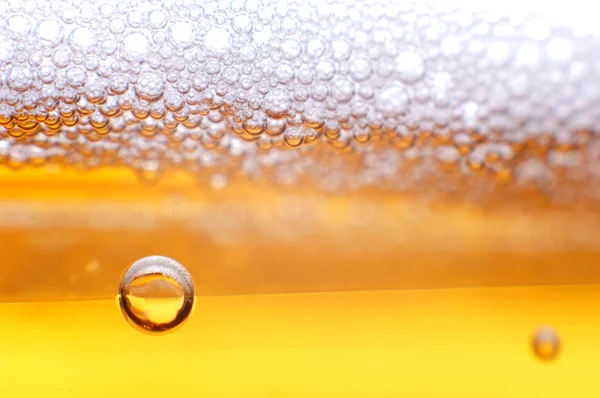 Foam on a light beer. — Stock Photo, Image