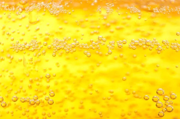 Milhares de pequenas bolhas de cerveja . — Fotografia de Stock