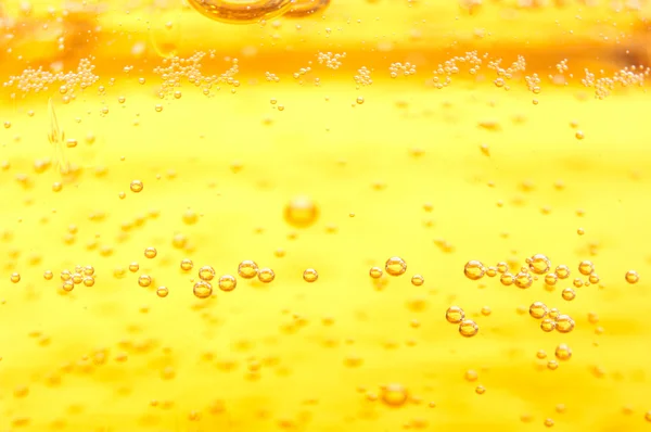 Thousands of small bubbles in beer. — Stock Photo, Image