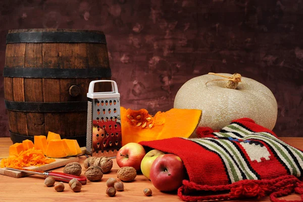 Pumpkin, ethnic bag and fruit — Stock Photo, Image