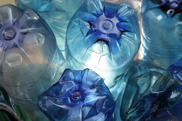 Blue plastic bottles — Stock Photo, Image