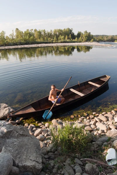 Boat oarsman on river — Stock Photo, Image