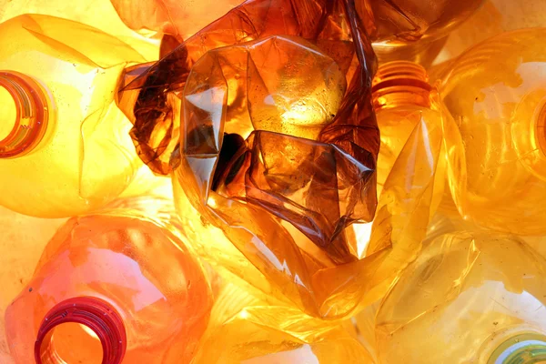 Orangefarbene Plastikflaschen — Stockfoto
