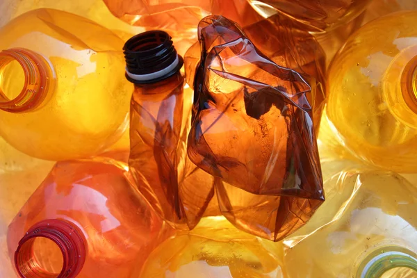Orange plastic bottles — Stock Photo, Image
