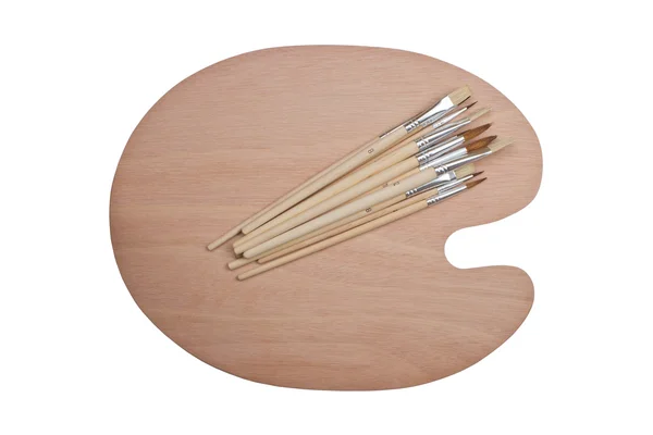 Tavolozza d'arte in legno con pennelli — Foto Stock