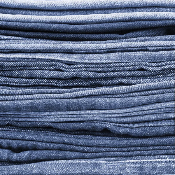 stock image Jeans trousers stack closeup