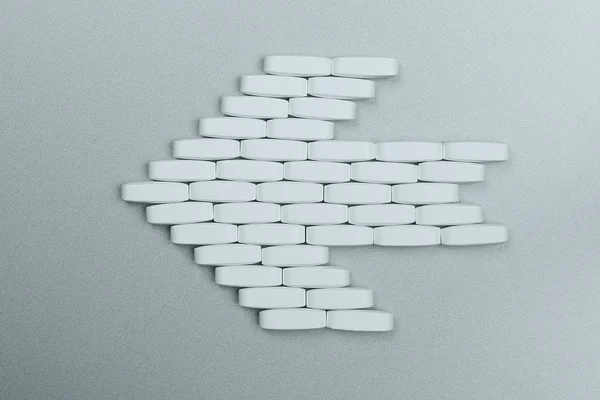 Flecha hecha de pastillas —  Fotos de Stock