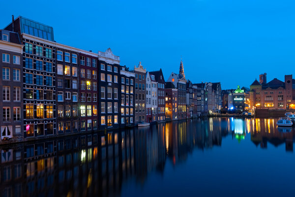 Wonderful view on houses of Amsterdam in night. GPS information is in the file.