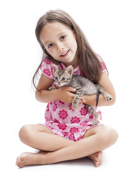 Little girl with a kitten