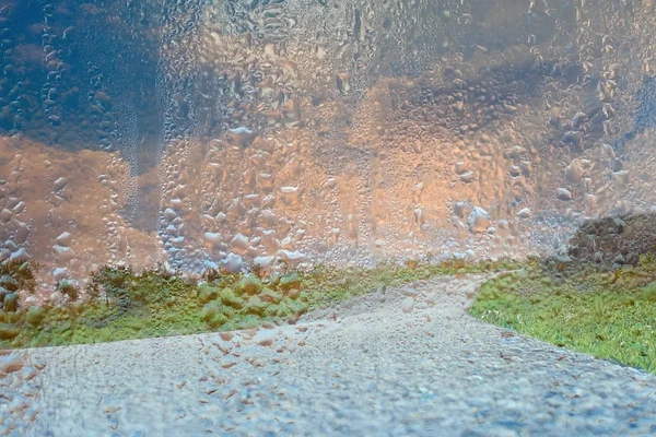 Road in mountain in rain — Stock Photo, Image