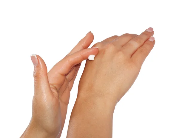 Wooman hands with cream — Stock Photo, Image