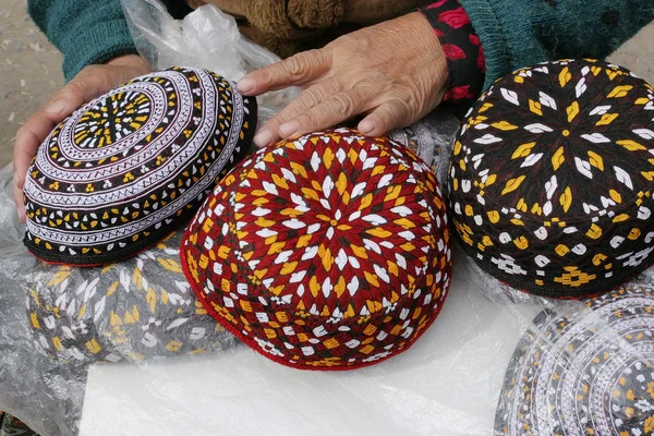 3 skull-caps. Turkmenistan. Ashkhabad market. — Stock Photo, Image