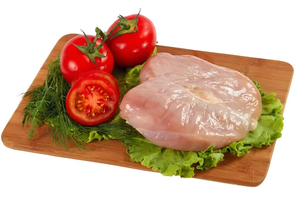 Rå kycklingfilé med grönsaker — Stockfoto