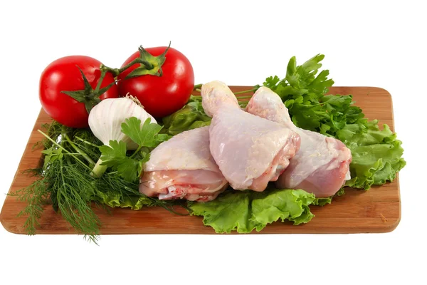 stock image Raw chicken thighs with vegetables