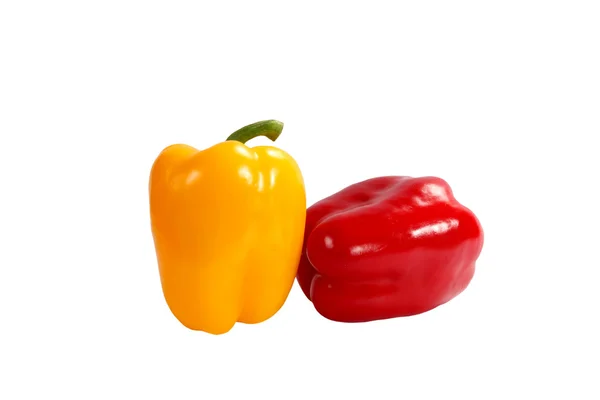 在白色背景上孤立的鲜黄色和红色辣椒 — 图库照片