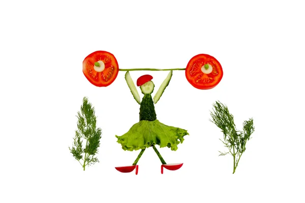 Zdrowe odżywianie. zabawny człowiek małe plasterki ogórka podnosi t — Zdjęcie stockowe
