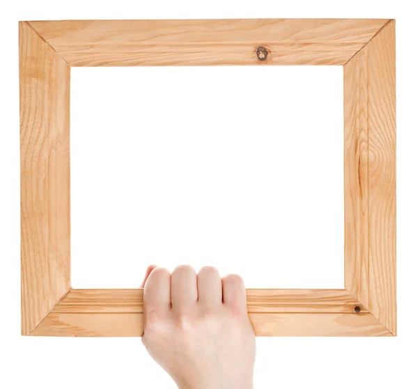 Wooden frame in hand — Stock Photo, Image