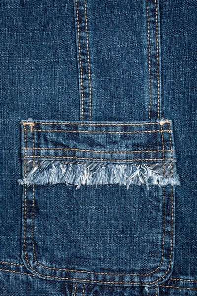 Ткань из синих джинсов с карманом — стоковое фото