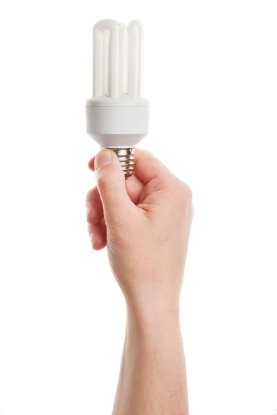 stock image Energy saving light bulb in hand