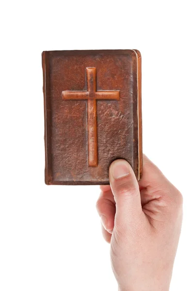 Hand holding the old bible — Stock Photo, Image