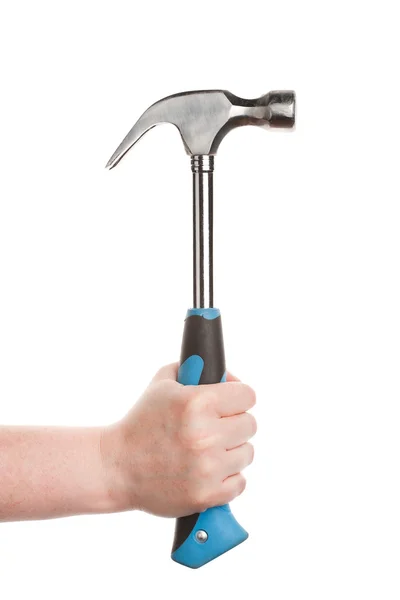 Vrouwelijke hand met een hamer — Stockfoto