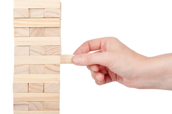 Tour de blocs en bois et une main — Photo
