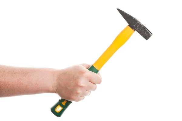 Mão feminina segurando um martelo — Fotografia de Stock