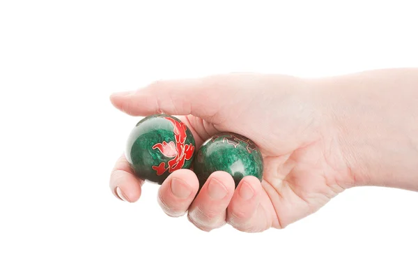 Green chinese balls in hand — Stock Photo, Image