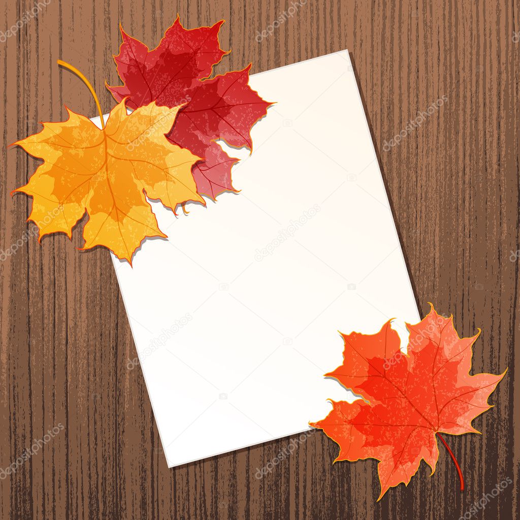 Maple leaves with paper sheet