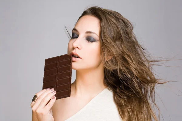 Chica chocolate sensual . Imagen de archivo