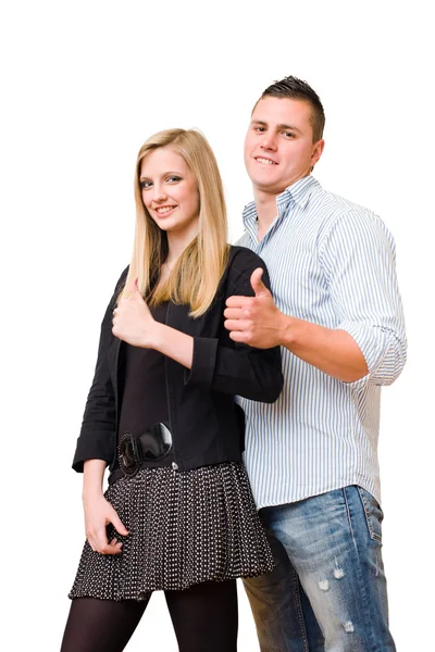 Молода студентська пара показує великі пальці вгору . — стокове фото