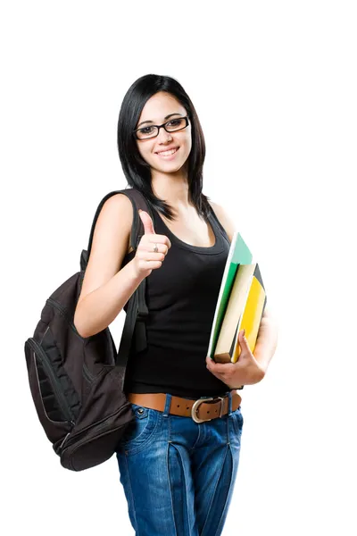 Beautiful young student girl showing thumbs up. Stock Picture