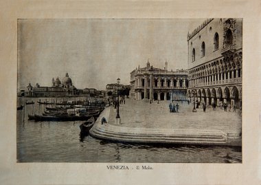 ITALY - CIRCA 1910: A picture printed in Italy shows image of embankments in Venice, Vintage postcards 