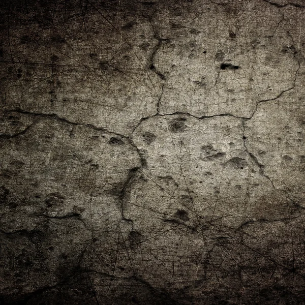 Risse in der dunklen Mauer — Stockfoto