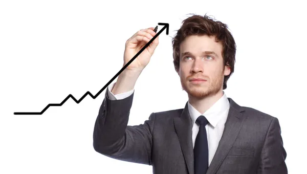 Geschäftsmann zeichnet ein Diagramm (Wachstum) — Stockfoto