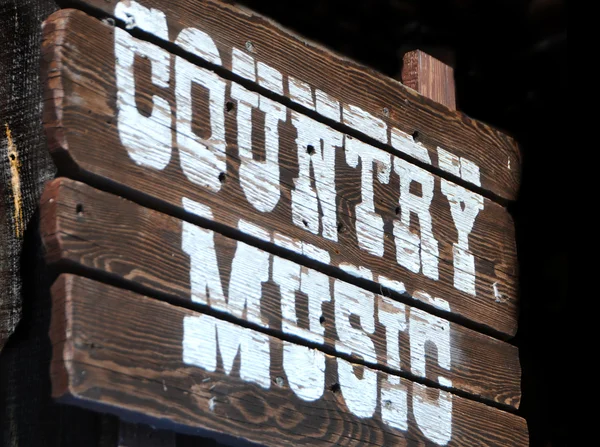 Música country em um tabuleiro de madeira — Fotografia de Stock