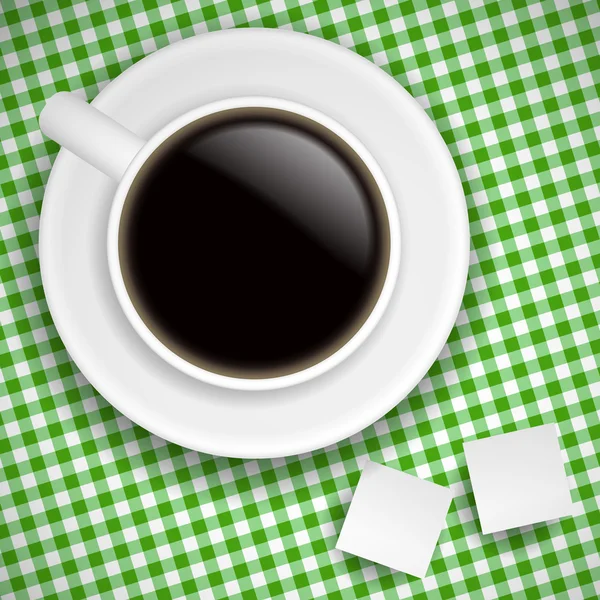 Tasse Kaffee auf grünem Tischtuch — Stockvektor