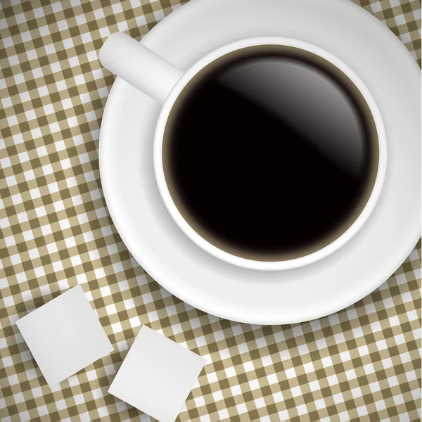 Šálek kávy na hnědý ubrus — Stock fotografie