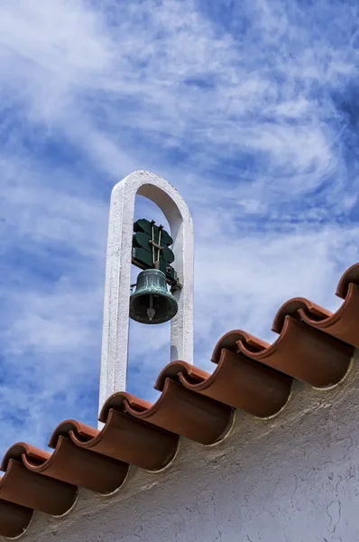 stock image Bell in the roof with amazing sky