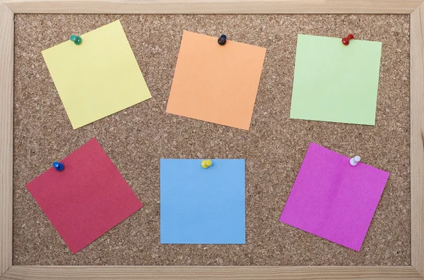 Cork board with post its Royalty Free Stock Images