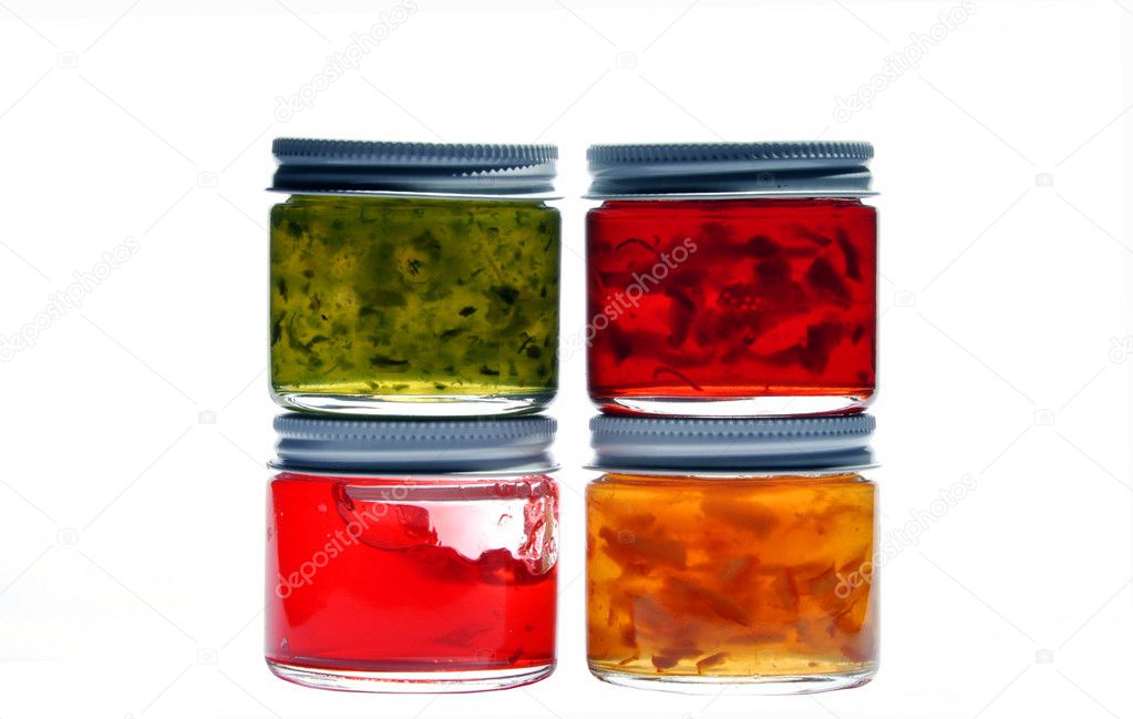 Four jam jar isolated on white background