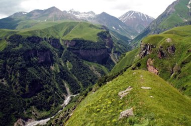 Famous Georgian Military Highway, Caucasus mountains, border bet clipart