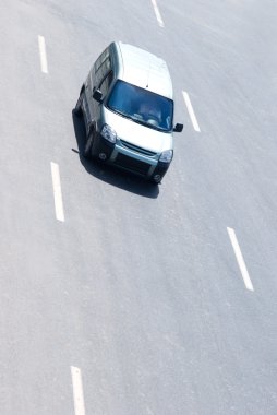 White van on highway clipart