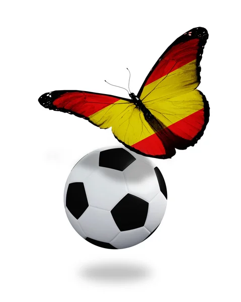 Koncept - fjäril med spansk flagg nära bollen, som — Stockfoto